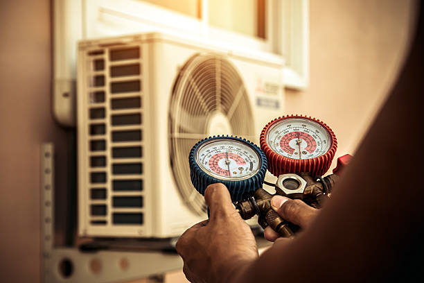 Professional Air Conditioning Service technician working in Morgantown, WV